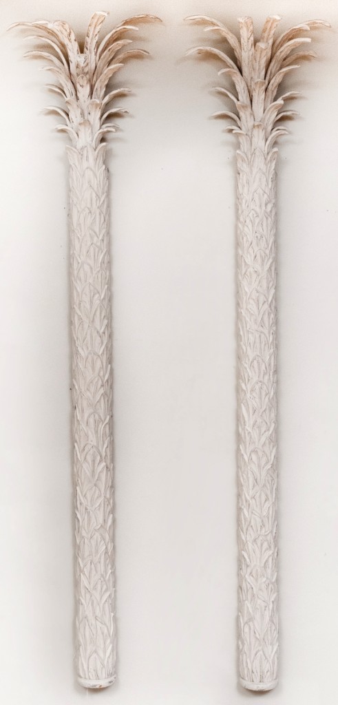 Emblematic of the John Rosselli style, this pair of white painted palm tree pilasters was the highest priced lot in his collection to cross the block, attaining $11,070.