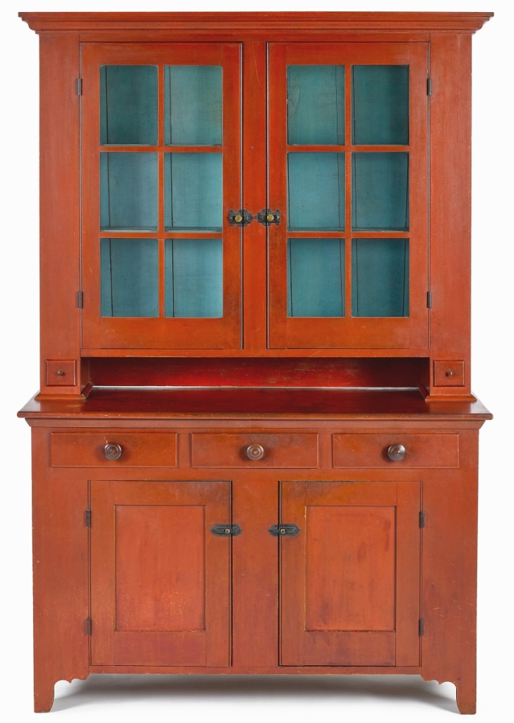 The second highest lot in the sale was this Ohio Mennonite painted poplar Dutch cupboard that brought $43,920. In a vibrant red, past handlers included Ellie Hoover Walker and Allan Katz.