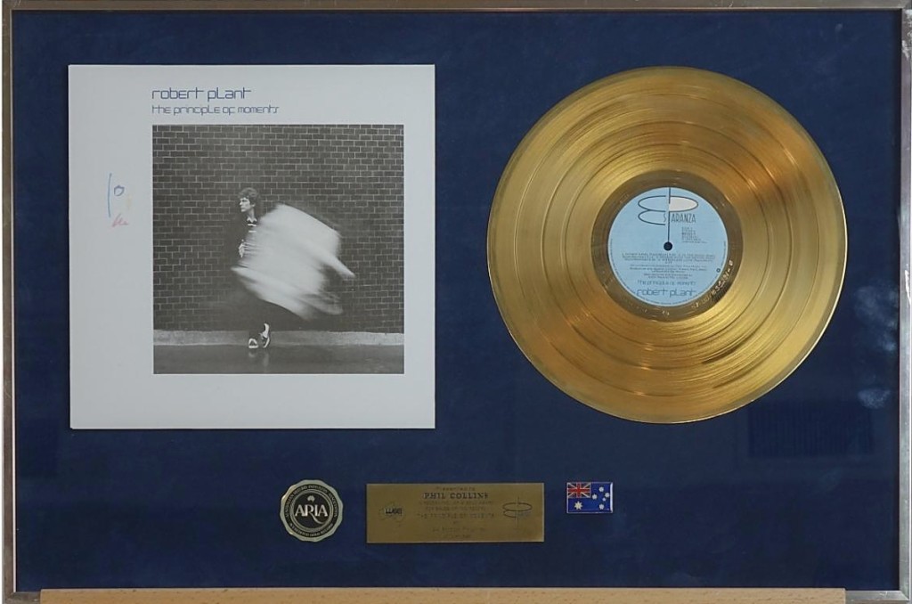 The gold record that Phil Collins received from WEA Records for his The Principle of Moments album, in which he collaborated with Robert Plant, spun into orbit, bringing $6,050, the most realized for a single gold record in the sale ($100-$1,000).