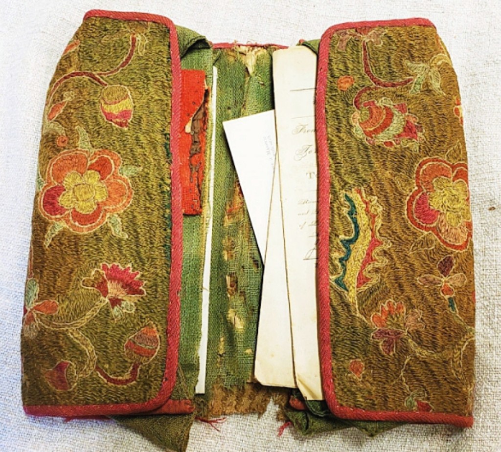 One of the earliest textile sales in the show was this 1740s crewel embroidered man’s wallet, which Judi Stellmach, Blue Dog Antiques, Stafford Springs, Conn., described as “quite rare.”