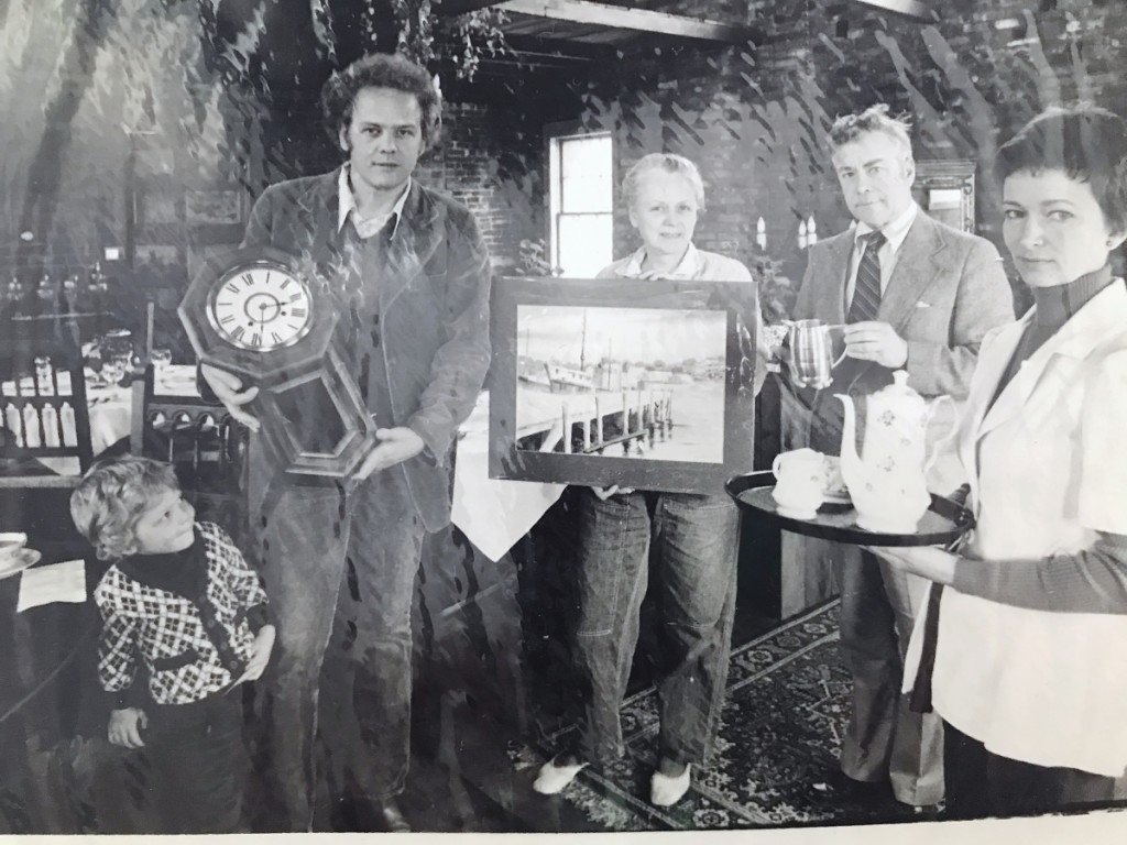 From left to right, Nathaniel Snow, Chris Snow, unidentified person, Swift Barnes and unidentified person, in a photograph taken at an auction in 1974.