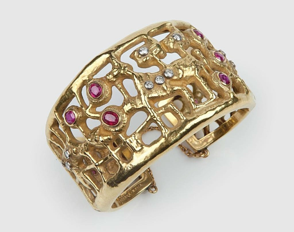 Italian painter Afro Basaldella designed this gold bangle set with rubies and diamonds. It was made in the Rome workshop of Diderico Gherardi for Mario Masenza around 1960. Didier, Ltd., London.