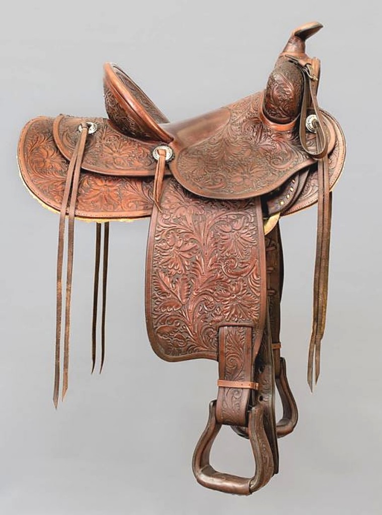 President Ronald Reagan gave this saddle to Buck Wicall, a friend of his who owned a tack and feed store near his ranch. The tooled leather saddle made by Edward H. Bohlin went out at $41,300.