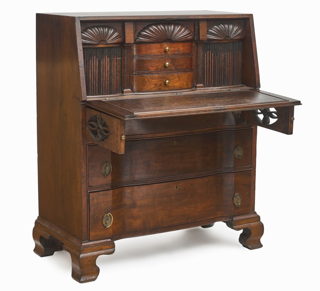 “People liked that it had been tucked away for 25 years,” Hicks said of this Chippendale carved cherry and walnut block-front slant-lid desk, made in the early Nineteenth Century by John Shearer in Martinsburg, Va. It brought the highest price in the sale, selling to a phone bidder on the East Coast for $37,812 ($40/60,000).