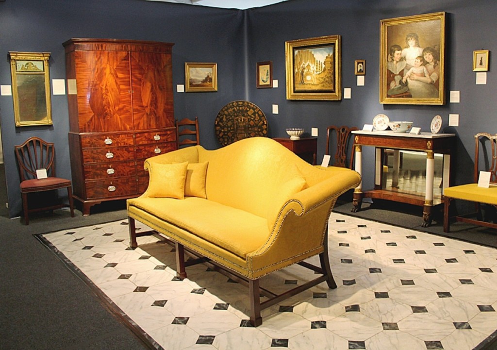 “When he later unveiled that glorious sofa, meticulously brought back to its original glowing appearance, it drew gasps and universal praise,” said David Schorsch on the camel-back Philadelphia sofa seen center, exhibited at the 2016 Philadelphia Antiques Show.         —Laura Beach photo