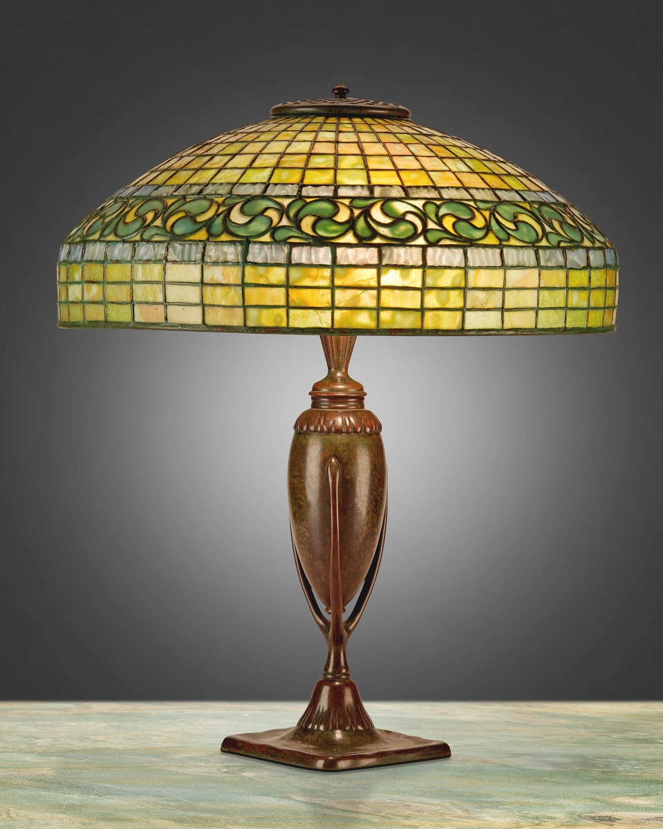 The top Tiffany Studios “Vine Border” table lamp earned $29,250. “This had the gold geometric wide bands of foliage,” said Moran, the shade pairing very nicely with the base. “A really nice package.”