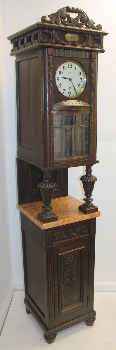“It was a really unusual form,” Roxanne Reuling said of this Vedette Renaissance Revival-style grandfather clock that had a beveled glass door, marble shelf and lower cabinet. A long-time collector client from Massachusetts took it for $1,375.