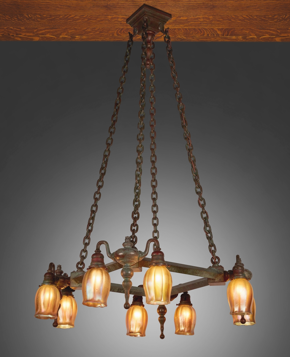 A Tiffany Studios Favrile glass and bronze chandelier was bid to $31,250. Said Moran, “It has a pretty unusual form. It’s not your traditional stained glass fixture, and it has a kind of a nice appeal in that it has a broad use because of its rectangular format. It could go over a wide variety of furniture — you could put it over your pool table or in your dining room. It could be an entryway piece. It has a kind of a good aesthetic and nice proportion. The shades are all original and signed. The patina, the chain, everything was just right on.”