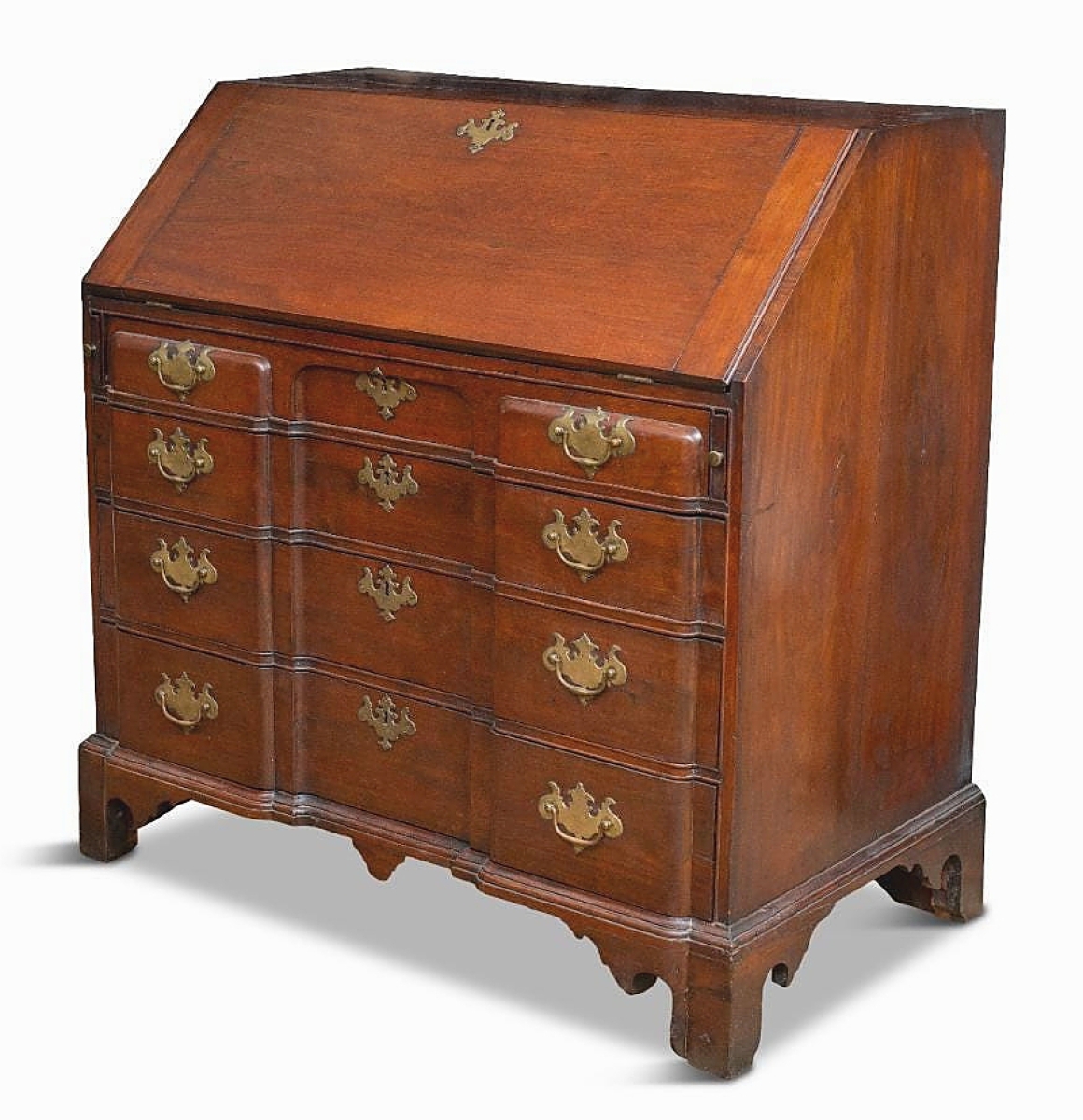 A Massachusetts block-front desk brought the second highest price of the sale, $10,238. The mahogany, circa 1770 Boston desk had a scalloped apron, bracket feet and replaced hinges. It had been advertised by Florene Maine in a 1959 issue of The Magazine Antiques.