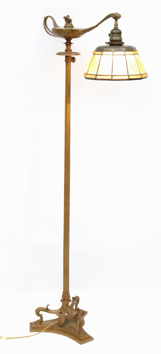 A Tiffany Studios Aladdin floor lamp, selling for $6,765, was accompanied by a 9-inch linen fold shade.