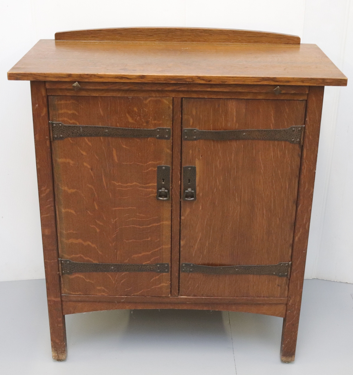 A notable furniture lot in the sale was this L&JG Stickley oak cellarette that earned $5,535.