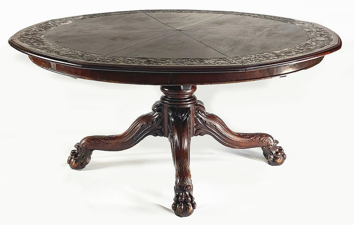 The large, round dining table made by Johnstone & Jeane’s, London, could be adjusted to three sizes, depending on whether it was used without leaves, or used with one of two sets of eight additional leaves of different sizes.  Without leaves, it was 63 inches in diameter. It was the highest priced item in the sale, finishing at $56,288.