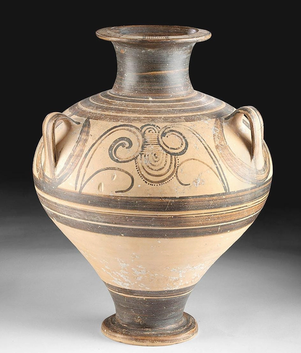 This terracotta amphora was Mycenaean, dating circa the Fourteenth Century BCE. The 12½ inch high example brought $29,818.
