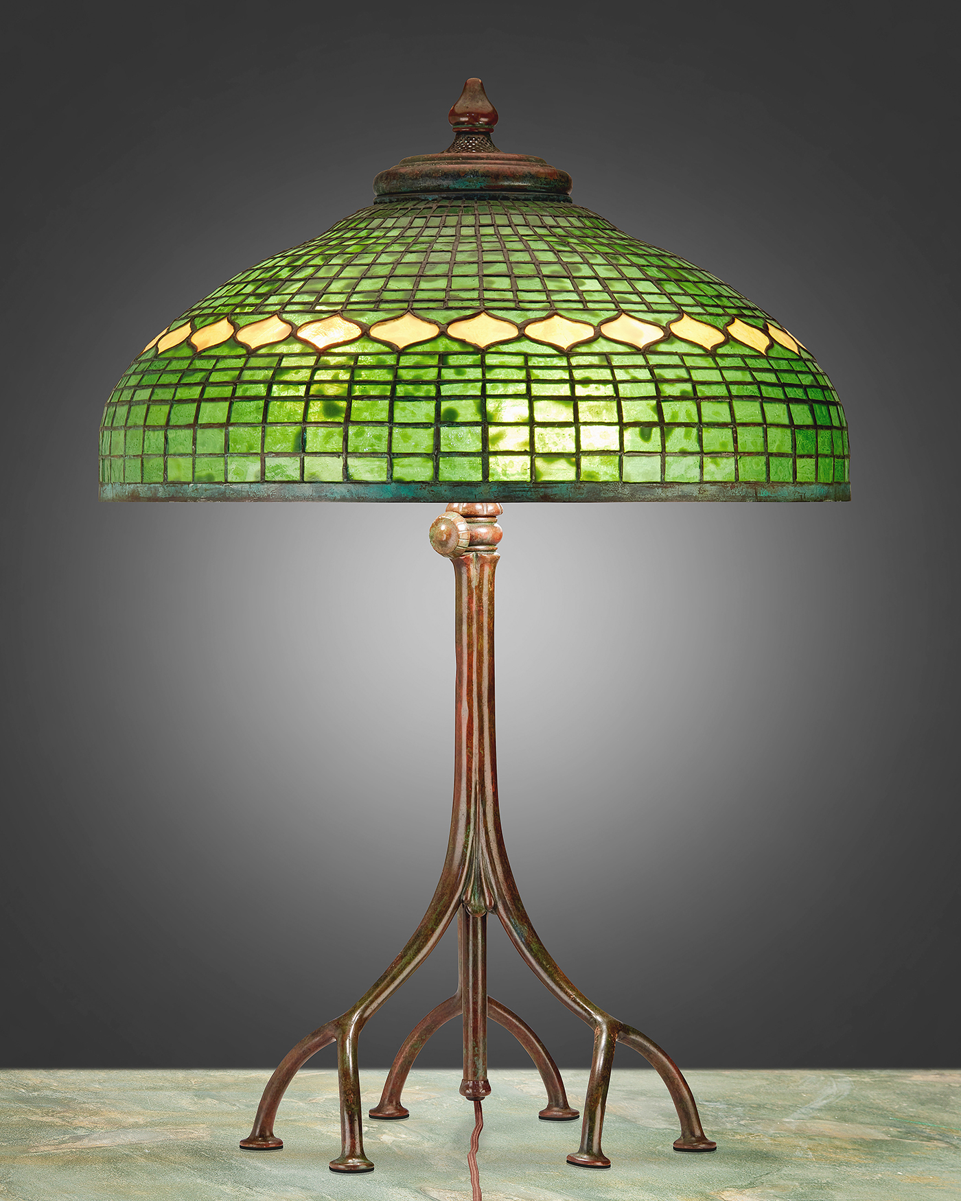 This Tiffany Studios “Vine Border” table lamp with the root base, according to Moran, was a bit of a mystery. “While we couldn’t really attribute the base to Tiffany and indicated that it was ‘spurious,’ whoever bought it didn’t have any problem with the base.” It sold for $29,250.