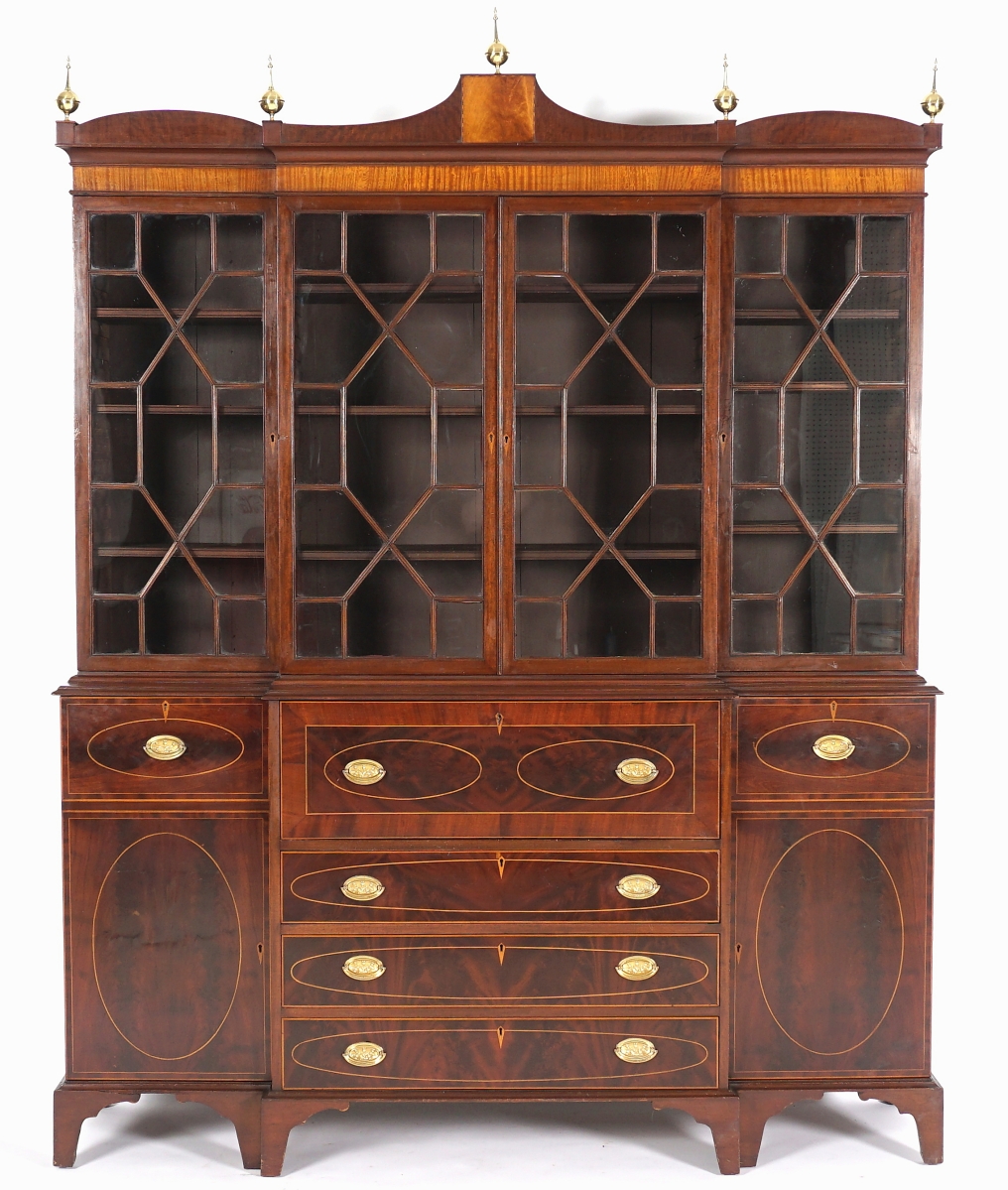 The American Federal inlaid secretary bookcase doubled its high estimate to finish at $10,030. Possibly of Pennsylvania origin, the circa 1800 breakfront featured a mahogany case with fruit wood string inlay.