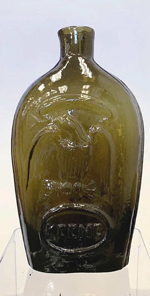 Ronald Korman found a buyer for this circa 1830-40 Masonic historical flask marked “Keene” across the front with an American eagle above it. Muleskinner Art & Antiques, Williamsville, N.Y.