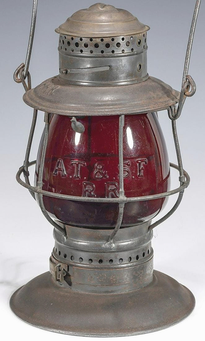 The third highest lantern result was found in this red globe cast with “A.T.&S.F.” over “R.R.” The 1870s Adams & Westlake brass top lantern featured an adjustable interior baffle to accommodate minor variations of globe size. The firm wrote that it was one of only four known and sold for $19,800.