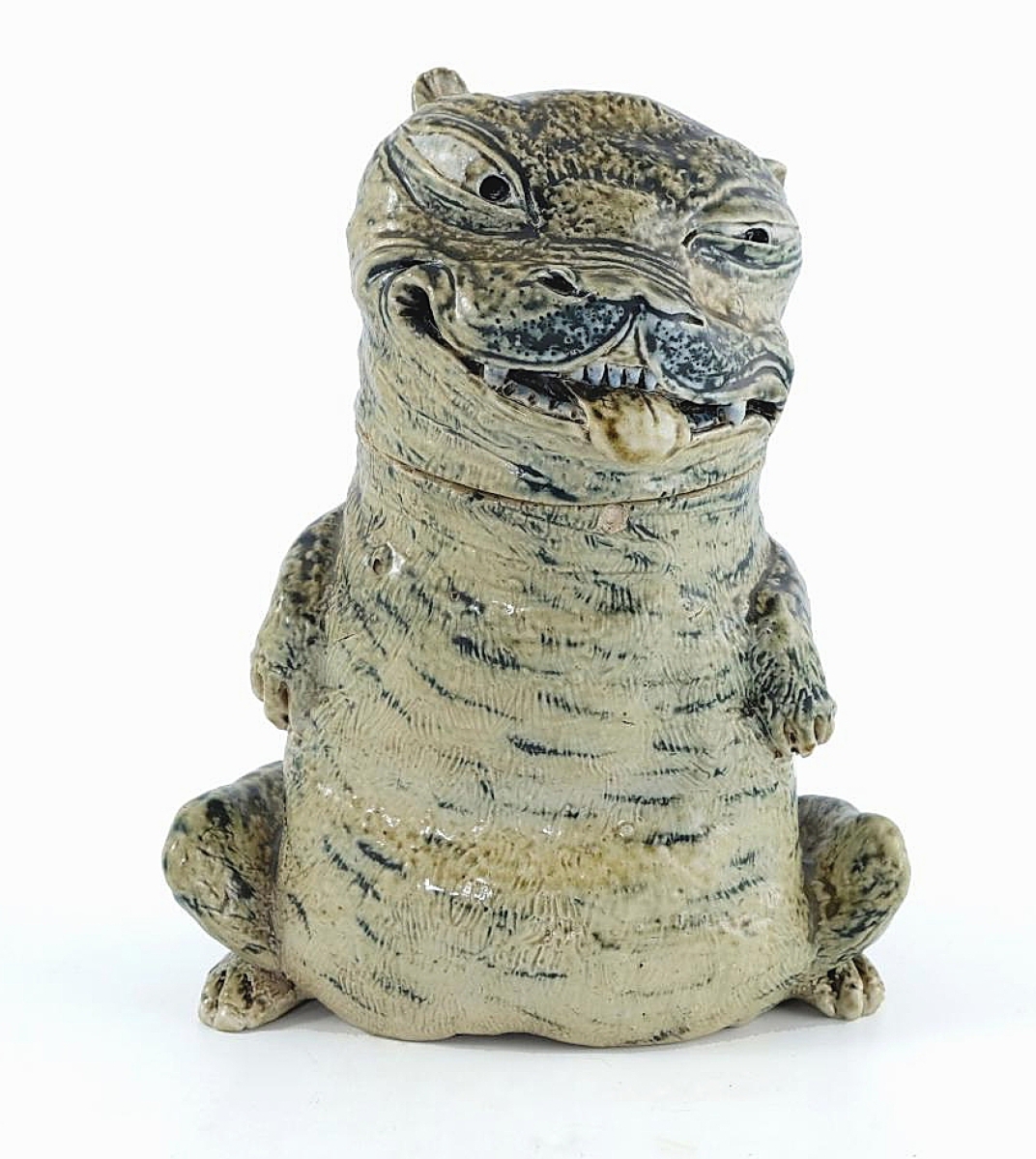 The second highest price in the sale was $67,896; it was realized for this sculptural dog jar modeled by RW Martin in 1885.