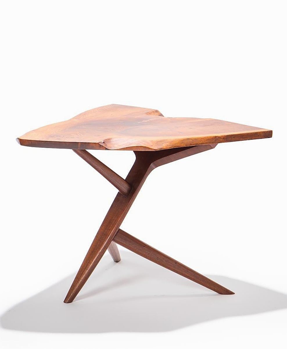 This Nakashima “Conoid” cross-legged side table, 1967, sold online to an American buyer for $27,225 ($12/18,000).