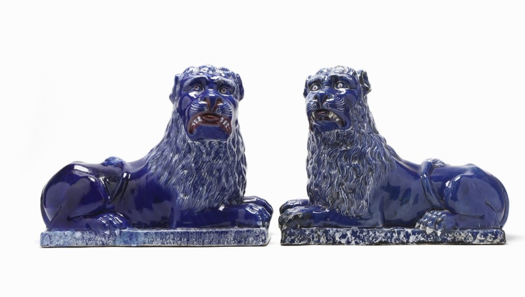 A buyer in New York paid $3,480 for this pair of blue faience guardian lions that dated to the early Nineteenth Century. Leland Little said their large size — 13¾ inches high and 17 inches long — was unusual.
