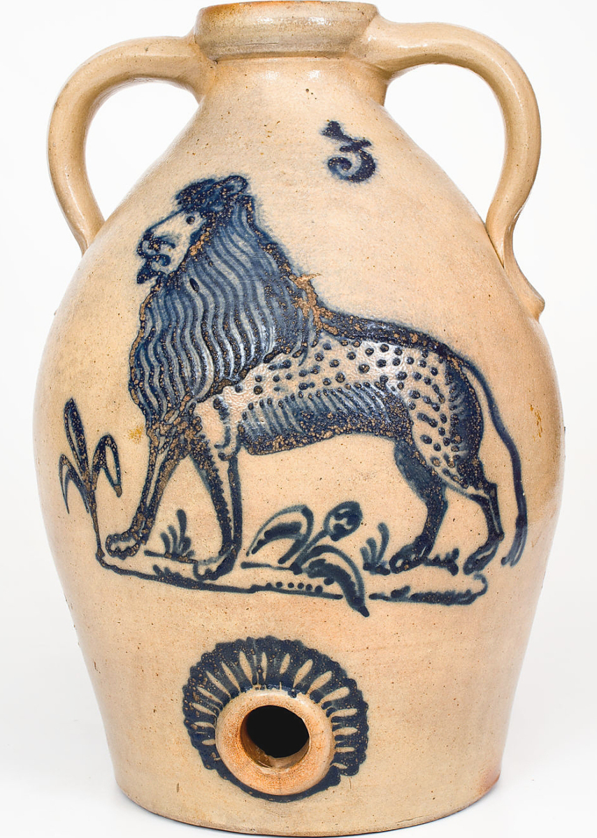 A 3-gallon stoneware cooler with a slip-trailed lion decoration by either Burger or Stetzenmeyer of Rochester, N.Y., went on to bring $32,400. The firm said it was unusual that it did not have a signature, indicating it may have been made for someone within the potting community. 16 inches high.