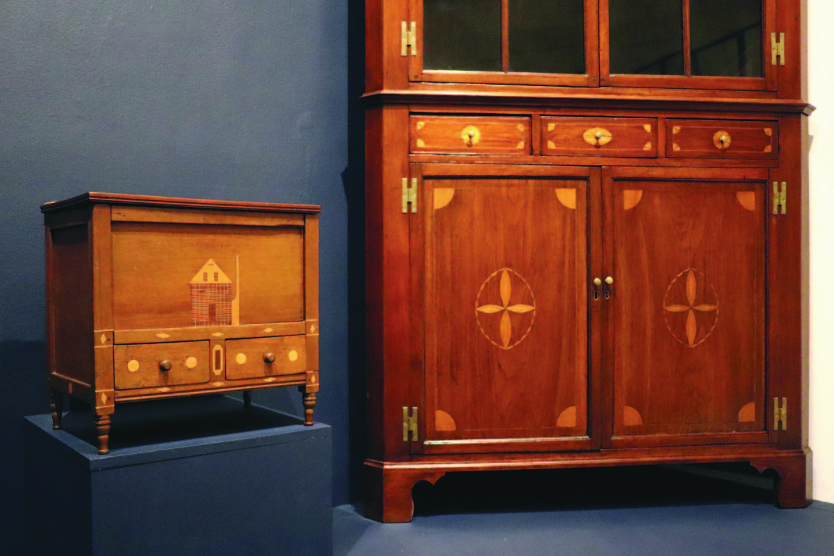 The inlay on this chest shows a small house, very similar to some samplers from East Tennessee around the same time. Sugar Chest, East Tennessee, circa 1820-30, walnut, poplar.