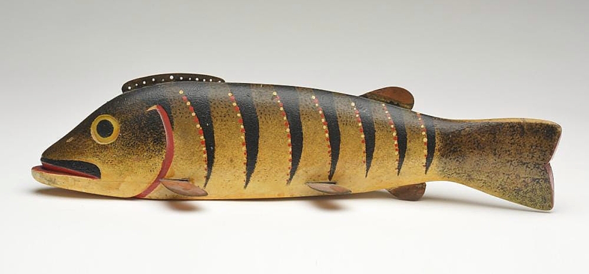 More than doubling the previous record for a fish decoy, this 20-inch carved and painted decoy, the largest known to have been made by Oscar Peterson, sold for $114,000. Two other fish decoys in the sale also set new records.