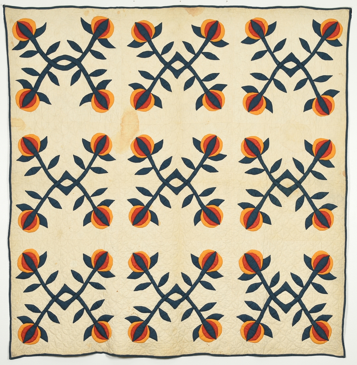Pomegranate pattern quilt by Isabella (Bell) Phillips Boyd (1862-1953), late 1800s. Cotton, 78½ by 76¼ inches. Gift of Dr Paul M. Goggans.