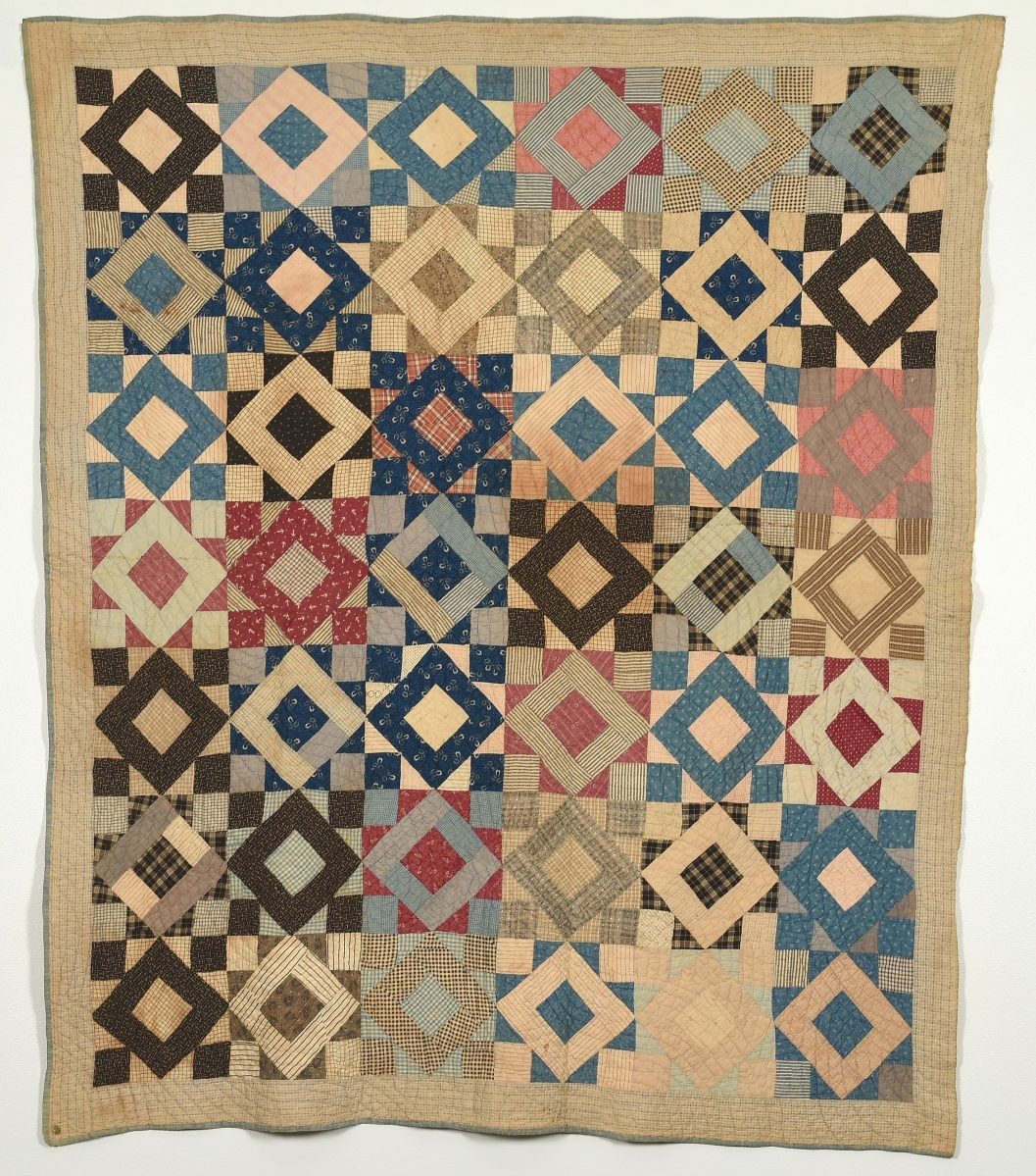 Triangle Square quilt by Beatrice Virginia Elizabeth Jenkins Phillips (1864-1942), late 1800s. Cotton, 78½ by 70 inches. Gift of Dr Paul M. Goggans.