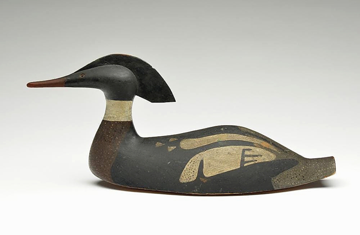 One of several decoys in the sale from the collection of Gary and Dale Guyette, this merganser drake was carved by Captain Edwin Backman of Nova Scotia. The catalog devotes six pages to this decoy, which sold for $120,000, including a detailed biography of the captain, which informs us that he died in a shipwreck in 1915. This decoy is well known to collectors, having been pictured in at least two books.