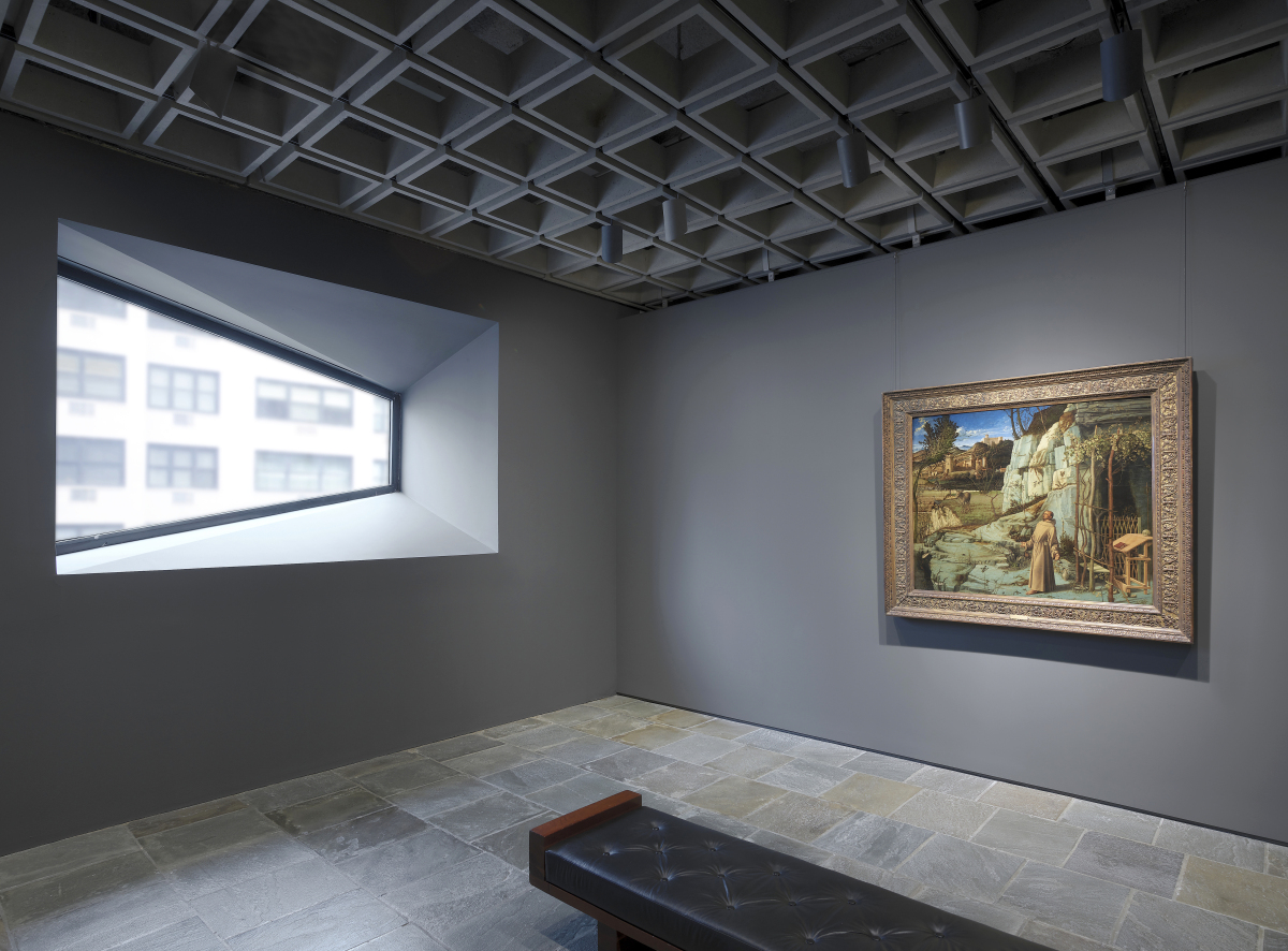 Bellini’s “St Francis in the Desert,” one of the Frick’s most important and loved works, is displayed in isolation, paired with one of the iconic trapezoidal windows Marcel Breuer conceived for the building.