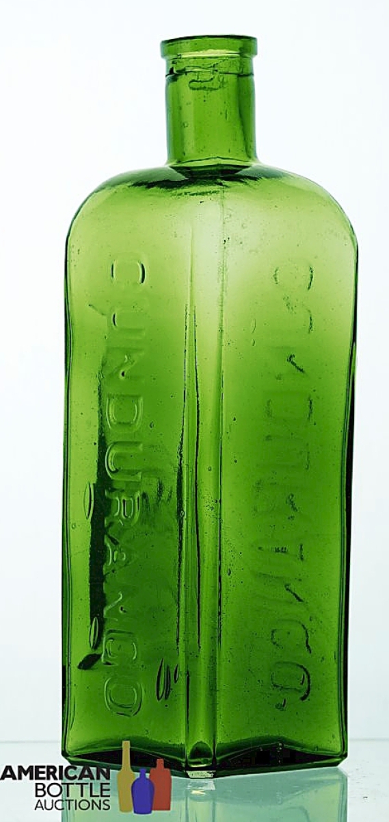 Selling for $4,000 was this bright green Cundurango/Cundurango. This bottle was trademakerd in 1871 and distributed from 1872-80.