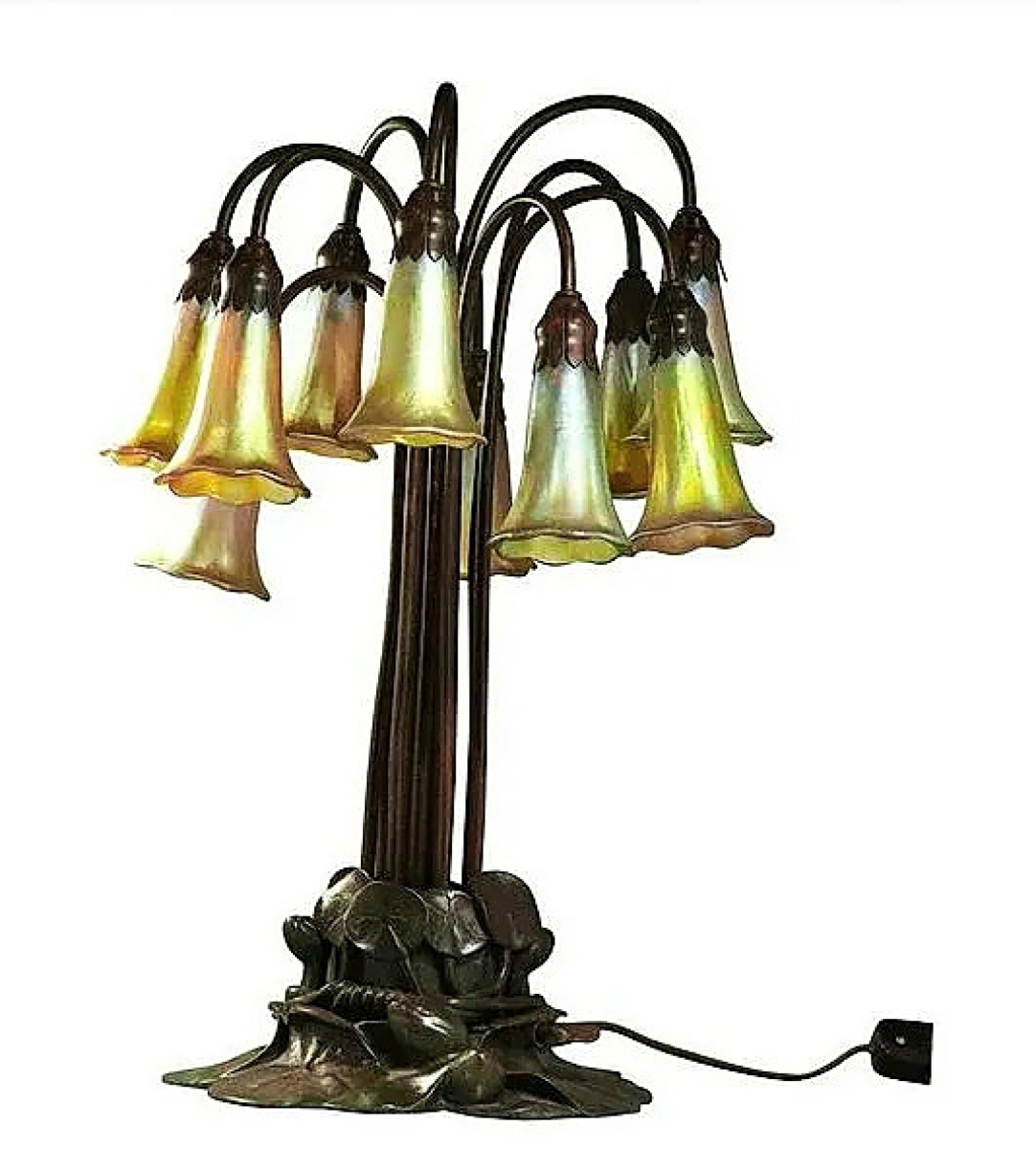 Tiffany Studios collectors were drawn to a 10-light Lily lamp with signed favrile shades and bronze base that took $10,625.