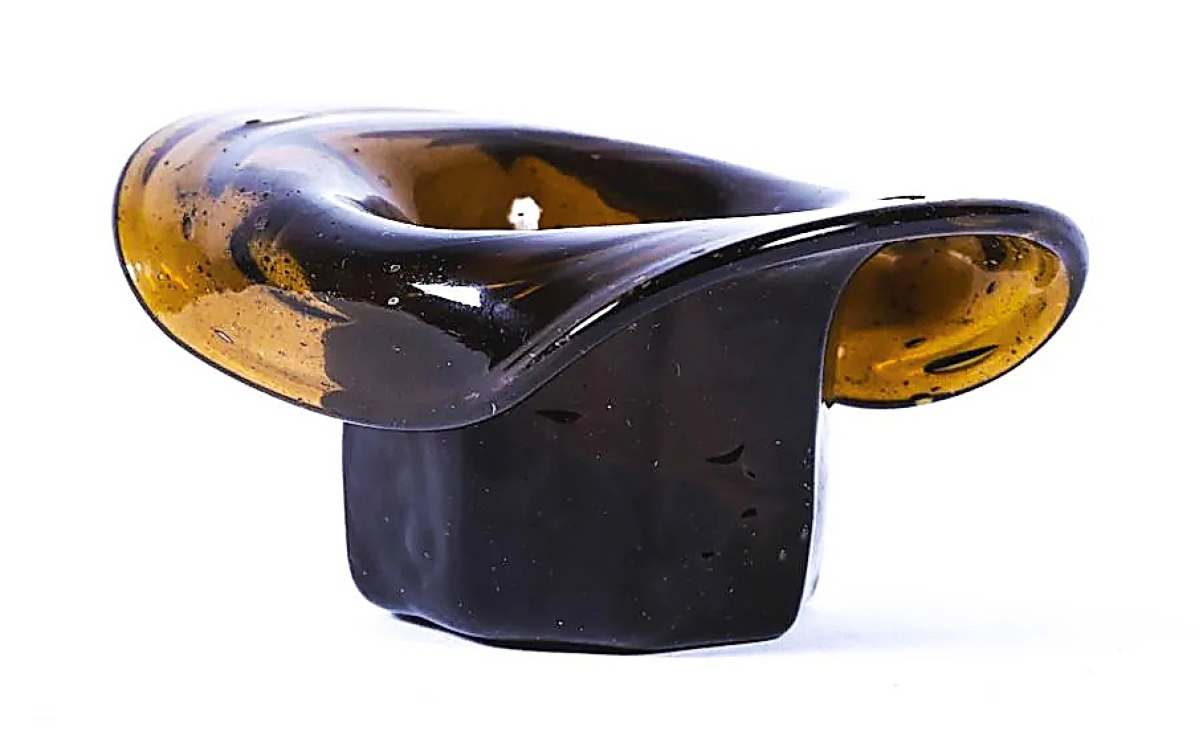 Bidders tipped their hat to this inkwell, which fielded the highest price per square inch in the sale. At only 1¾ inches high, the amber blown molded glass hat-form inkwell sold for $9,840.