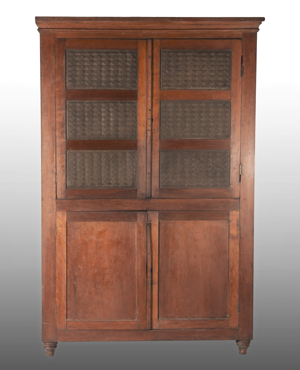 The sale’s leading lot was this 12-tin pie safe that sold for $20,060 to a North Carolina buyer. The safe was reportedly made in Guilford County, where the auction house is located. Ledbetter said it had been pulled out of a basement three weeks before the auction.