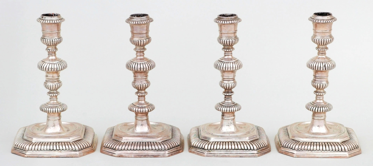 London silversmith Benjamin Sanders produced this matched set of four candlesticks in 1740-1741. The firm wrote, “Although dating from the early 1740s, the set is fashioned in the earlier William and Mary style.” The set brought $21,000.