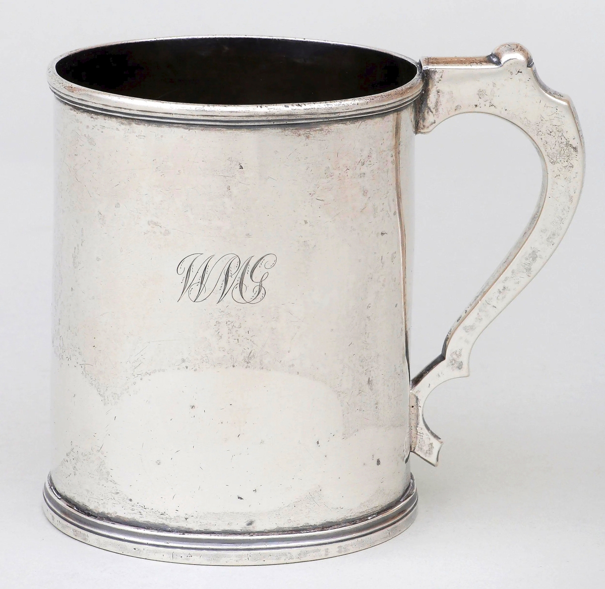 Simple in form, but high in price was this coin silver cann by Kentucky silversmith Asa Blanchard that brought $22,800. The firm noted that at 5 inches high, this was one of the of the largest and finest Blanchard canns known.