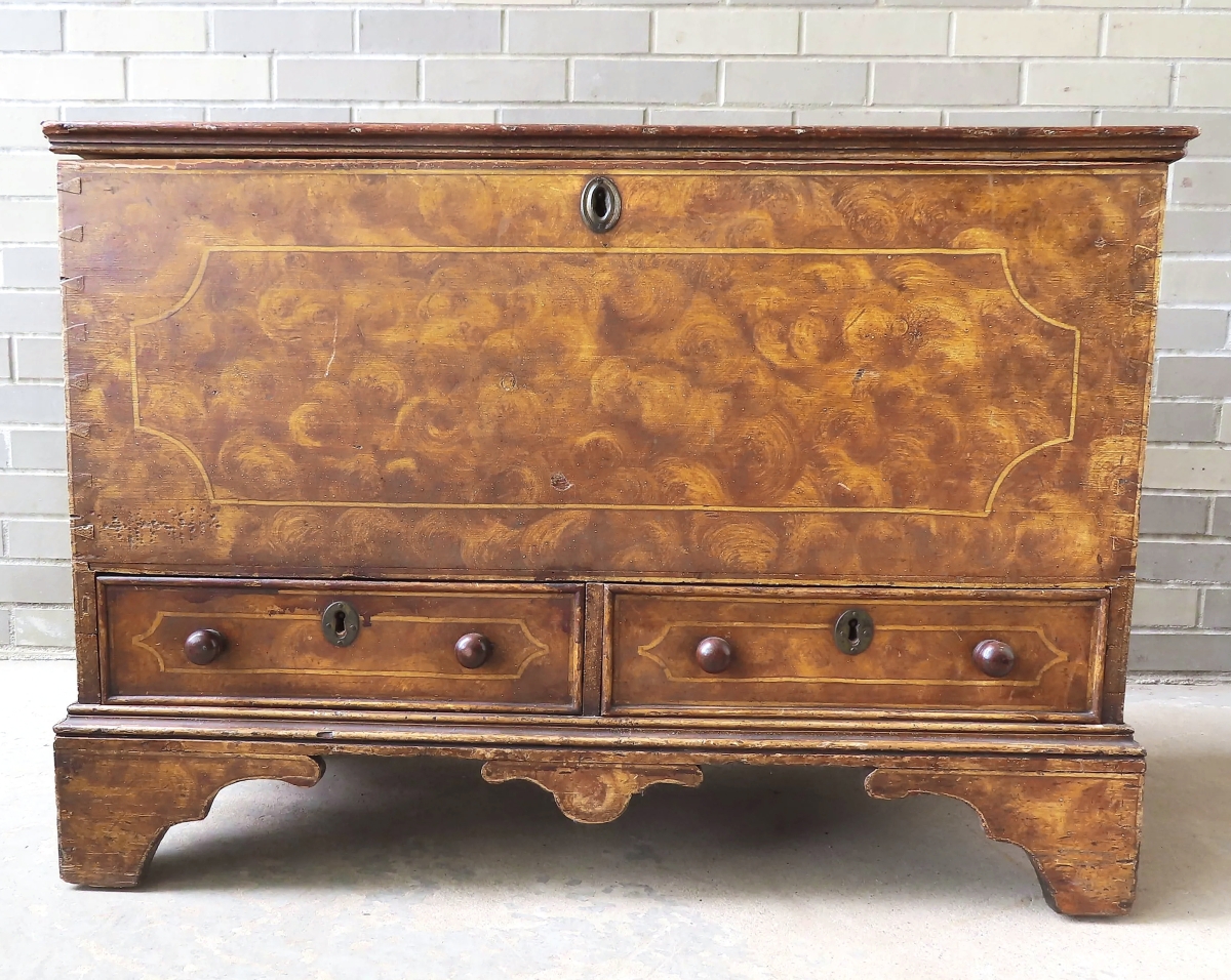 The sale’s leader was this sponge and grain paint-decorated blanket box with original paint and turned wood knobs. Bidders lifted it to $3,444.