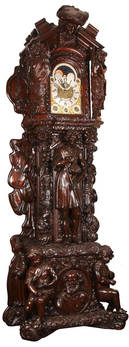 The monumental English carved oak tall case clock may have been made to tell time but it was also a feast for the eyes, with a pair of 3-foot-tall putti at the base flanking a central medallion of Sir William Whittington, a date of 1793 and much more. It struck $127,050.