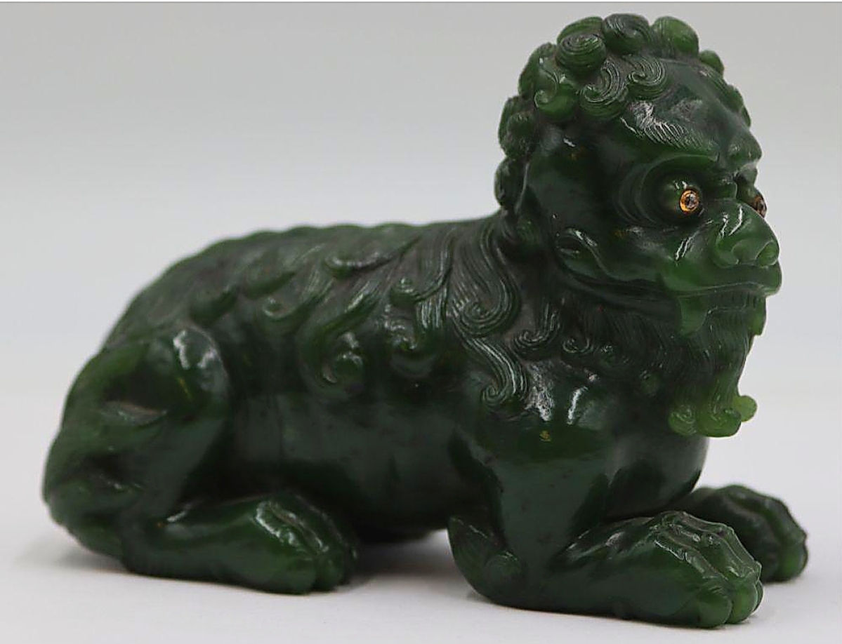 One of the top pieces from the New Rochelle estate of a world traveler and gemologist was this carved figural jade of a mythical beast with inset diamonds. Bidders around the world chased it and it finally sold for $40,000 ($800-$1,200).