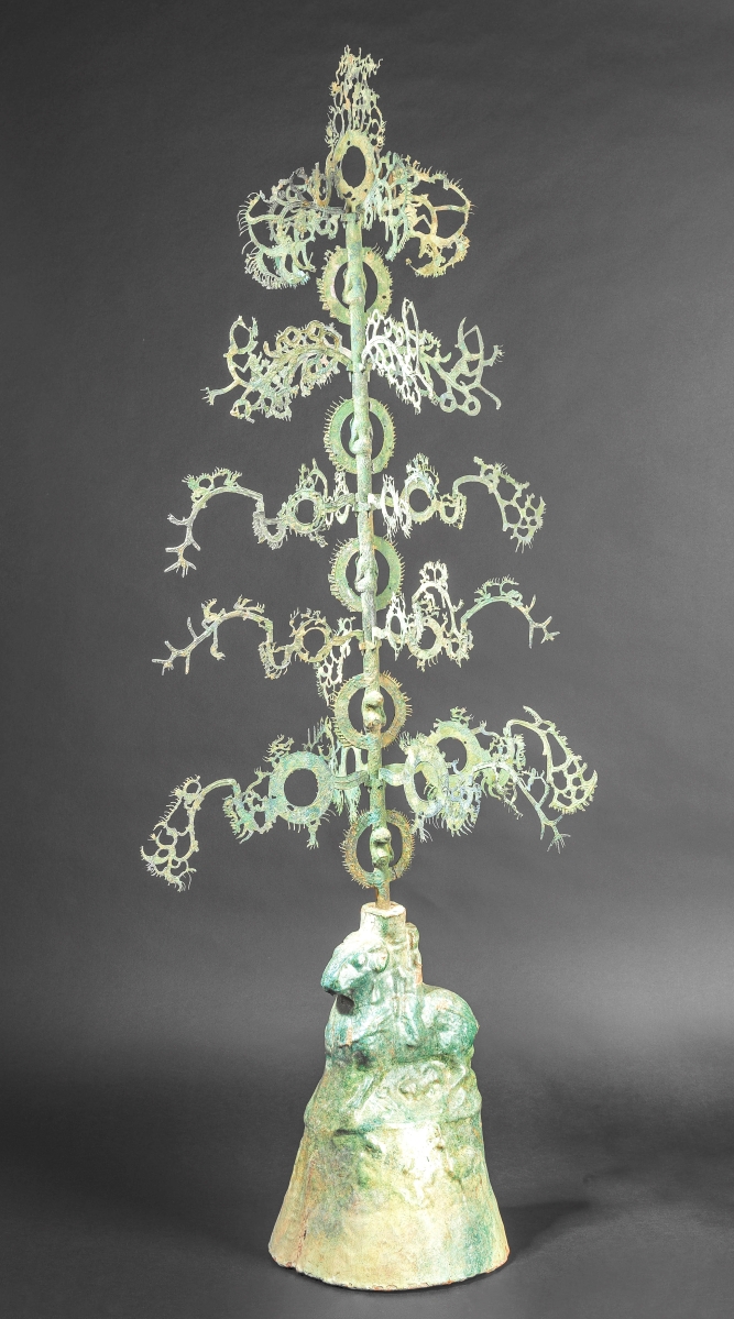 A verdigris bronze patina and animal ornamentation enhanced this Chinese coin tree from the Eastern Han Dynasty.  Dating back to 25-220 CE which was confirmed by a thermoluminescence test that came with the lot, it brought in $ 59,458.