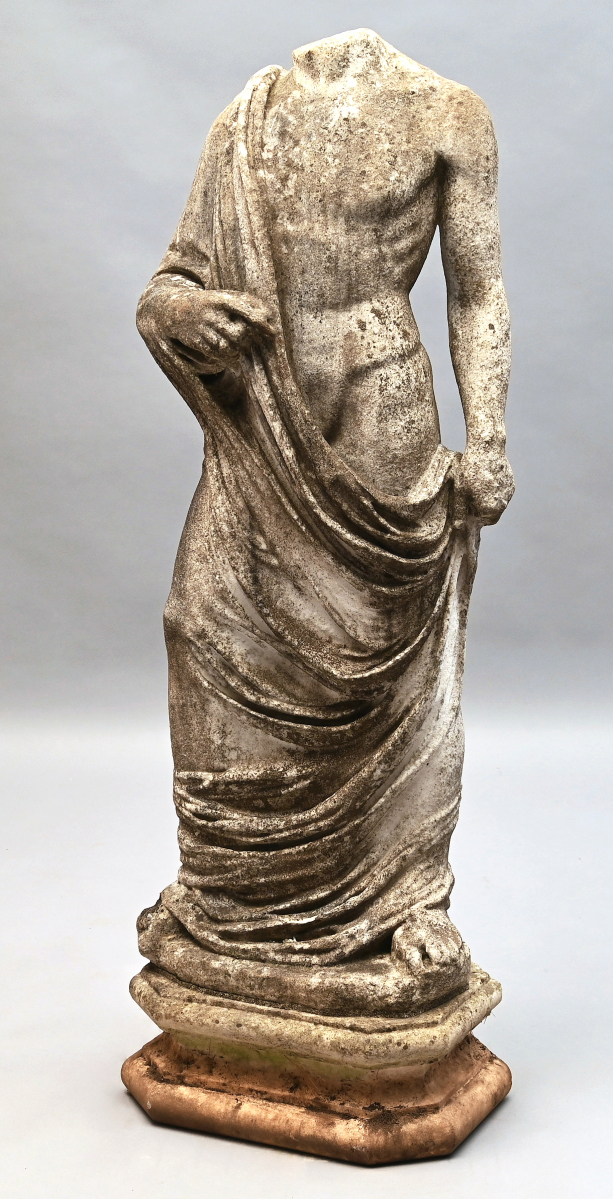A Nineteenth Century Greco-Roman carved marble garden sculpture of a headless, partially clothed male figure went out at $4,800.
