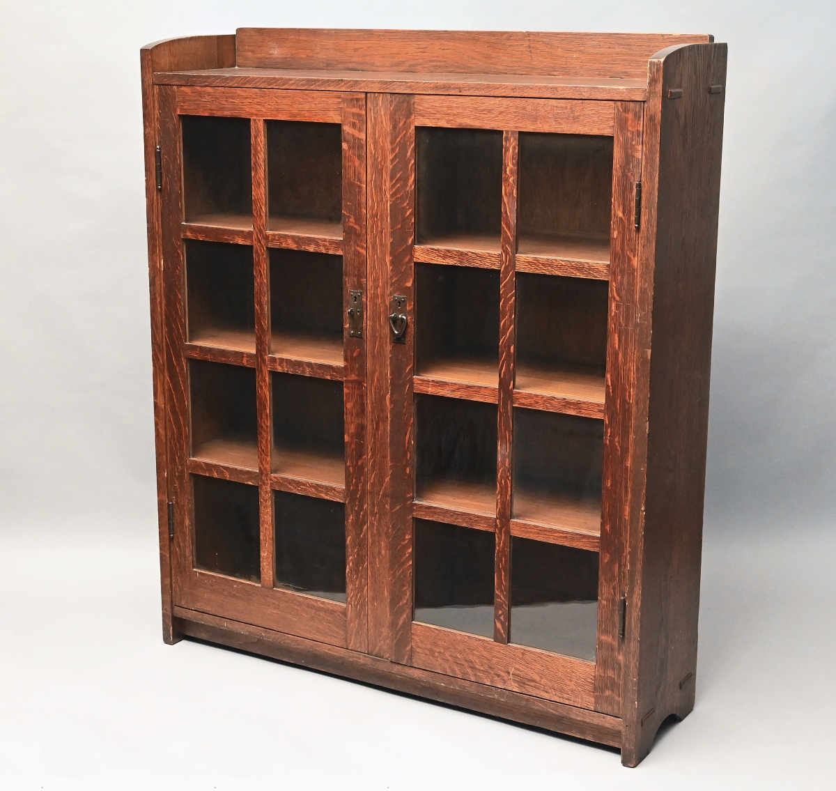 Fetching $4,375 was a Gustav Stickley Mission oak bookcase #717.