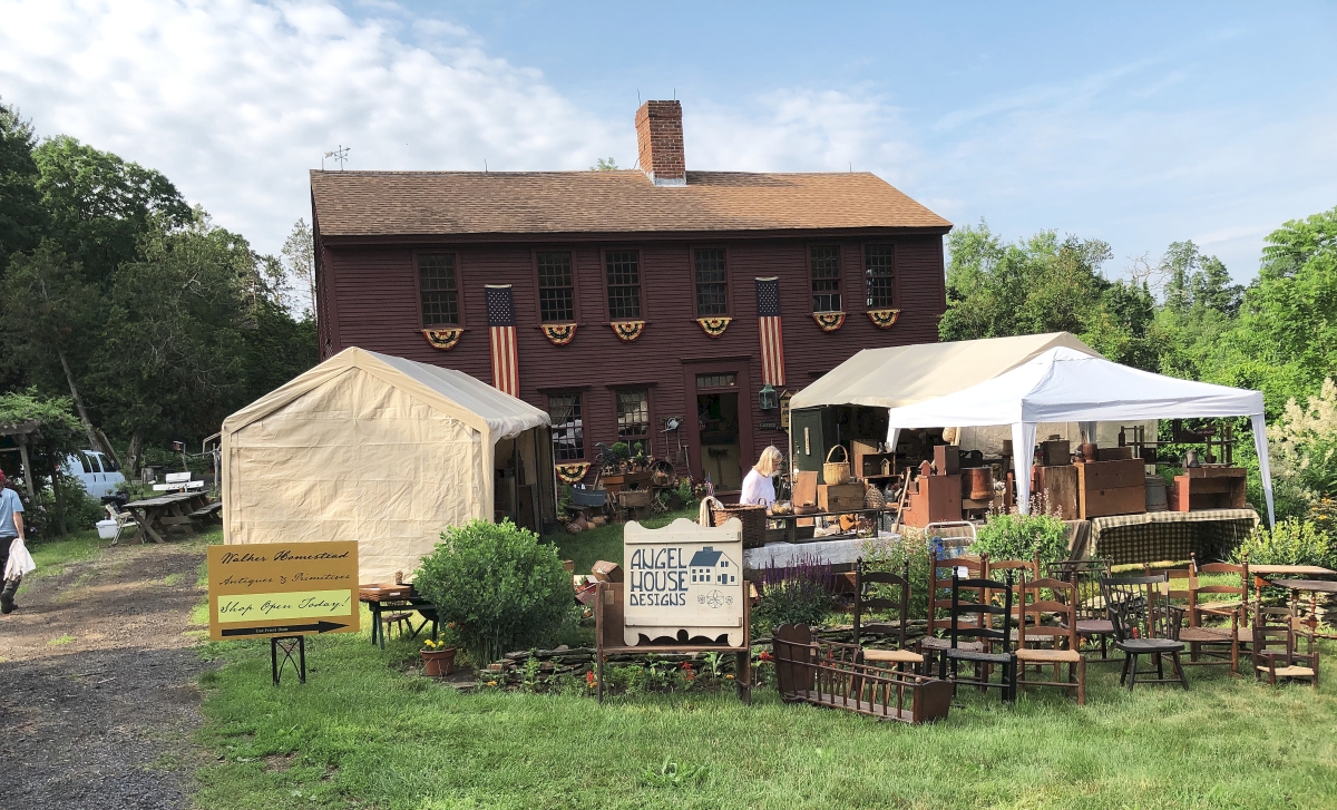 After driving down a curving dirt road and parking, the first thing a visitor sees to set the “mood” is Kris Casucci’s circa 1698 farmhouse surrounded by colorful herb gardens.