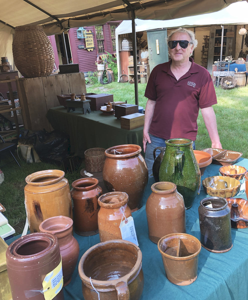 Warren Broderick was one of the dealers with a sizeable selection of redware. The large, green, two-handled jug was $150, and the tall jar on the left from Norwalk, Conn., was $250.