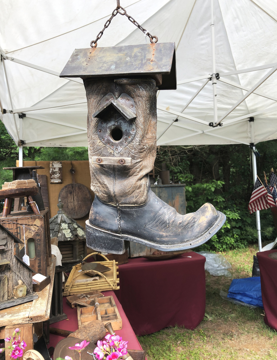 This was one of the more elegant birdhouses at the show. Stone and Wares, Princeton, N.J., priced the recycled western-style boot at just $45. It was carefully made, with decorative stitching and tin supports around its entrance, and a tin roof to protect its occupants from the weather.