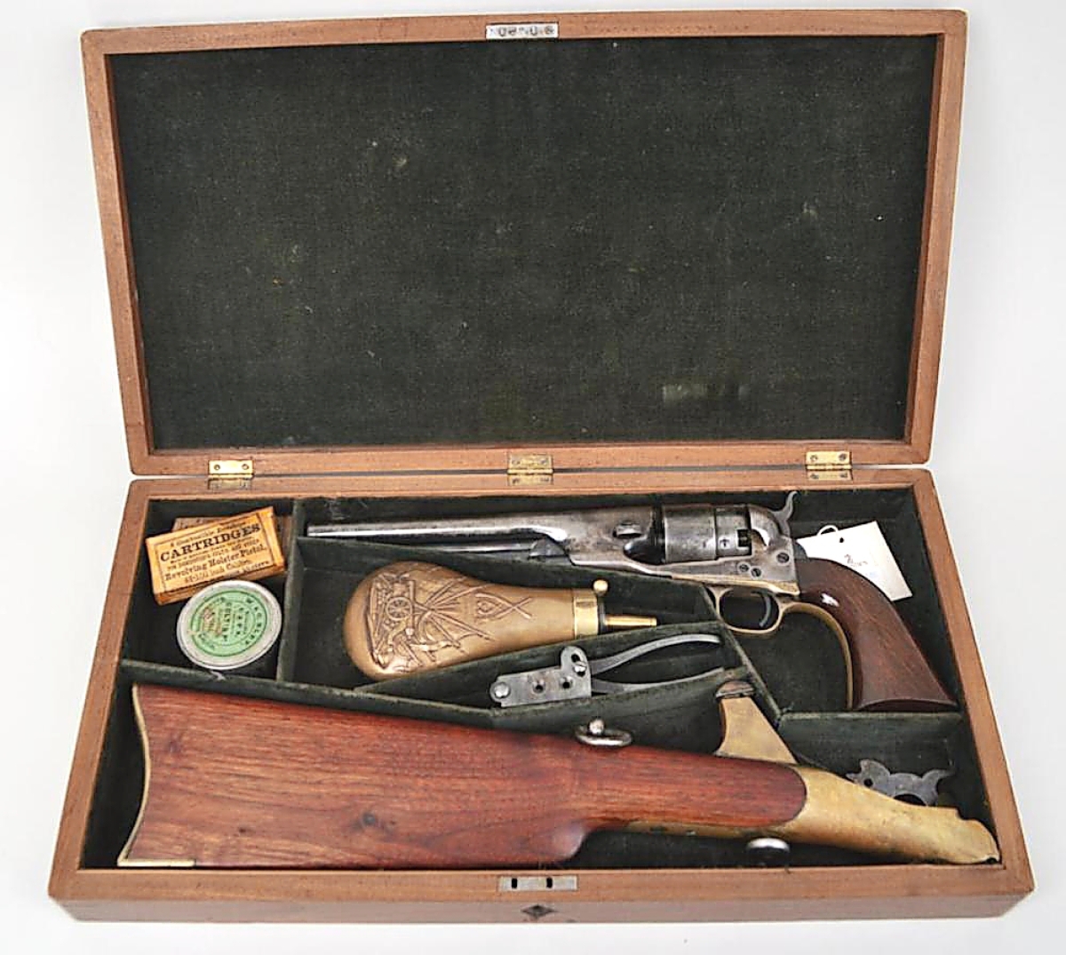 The top lot from a Fairfield County estate collection was this cased Colt .44 caliber army percussion revolver that went to an American buyer for $7,320 ($2/3,000).