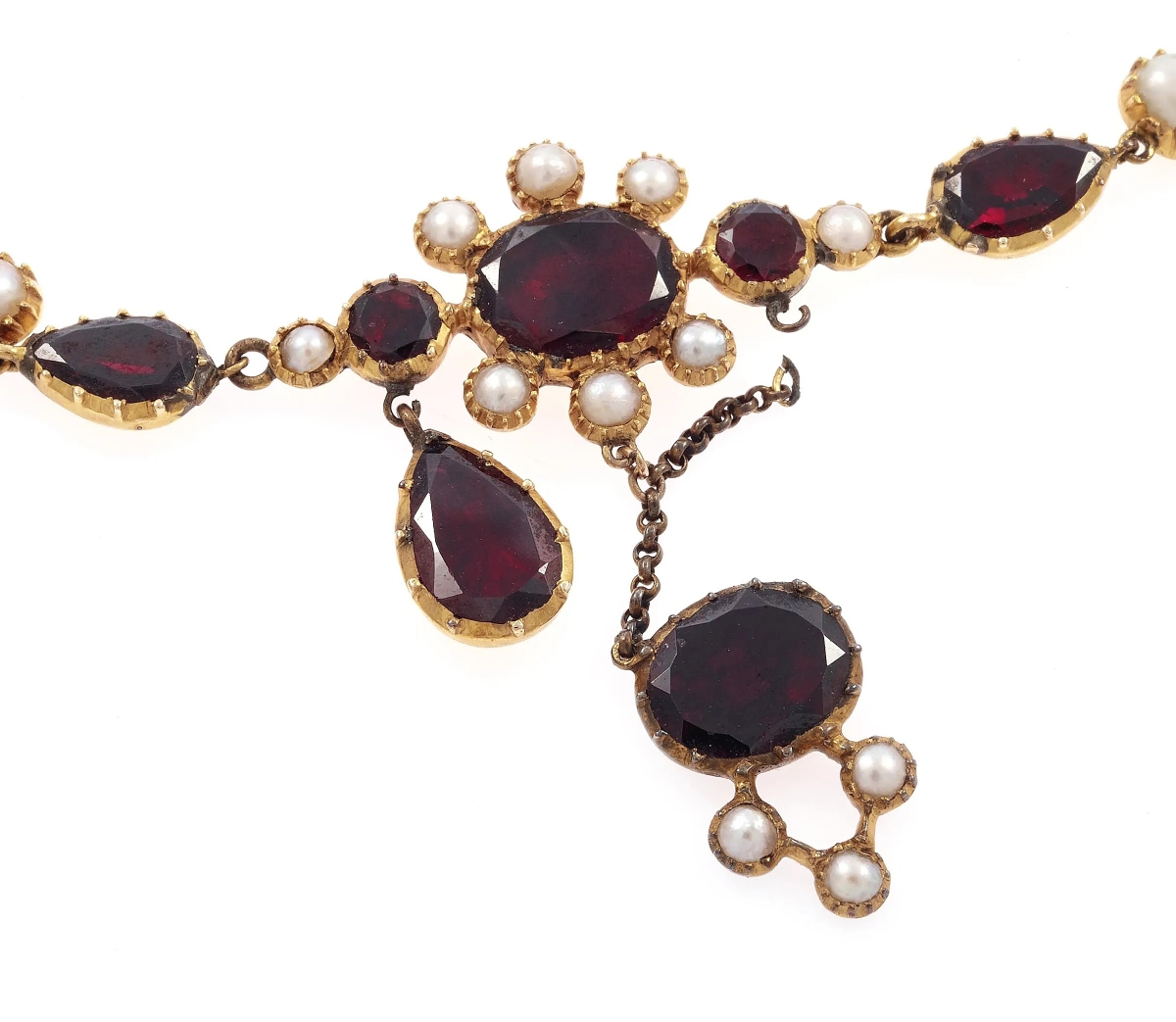 “The customer had my garbage can pulled out and was going to toss it because it was broken,” said Holly Anderson-Pree on this Georgian garnet, pearl and yellow gold necklace. It dated more than 200 years old and featured some breaks, which the specialist said is common for works of that age. The necklace made its way to the auction block instead, where it sold for $1,680.