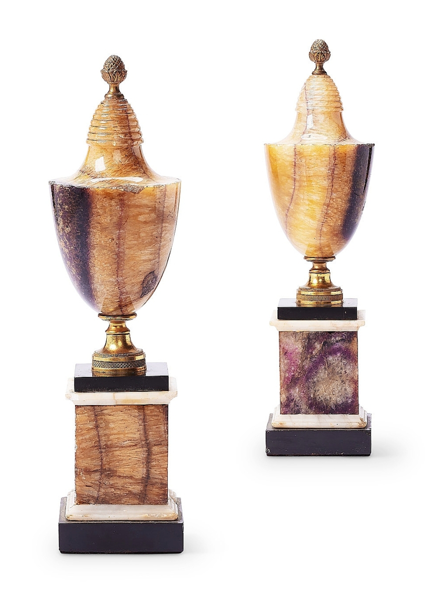 This exquisite pair of George III Blue-John and gilt-bronze urns brought $6,900 from a UK private collector, the second highest price of the day.