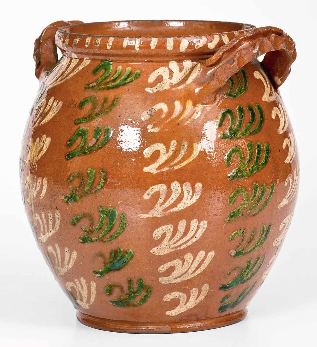 A redware jar that related to one in the collection of the Philadelphia Museum of Art sold for $132,000 above a $12,000 high estimate. The jar was attributed to Christian Klinker of Nockamixon Township, Bucks County, Penn. Circa 1773-98, Mark Zipp said it’s the distinct handles that relate to Klinker’s work. “The handles are well-done, the crimping is bizarre and very distinctive. They’re unmistakable,” he said. The work came from the collection of Lewis Fenley “Dusty” Parker, who had purchased it at Christie’s in 1999 from the John Gordon collection.